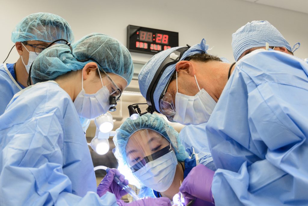 Dr. Sonick and students in a clinic